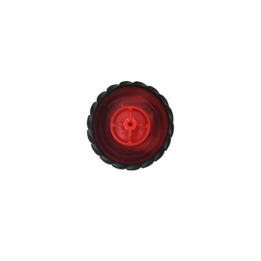 Red circular object with a black rim on a white background
