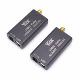 Two YRC radio transmitters on a white background