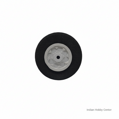 Wheel with black rim and white center on a white background