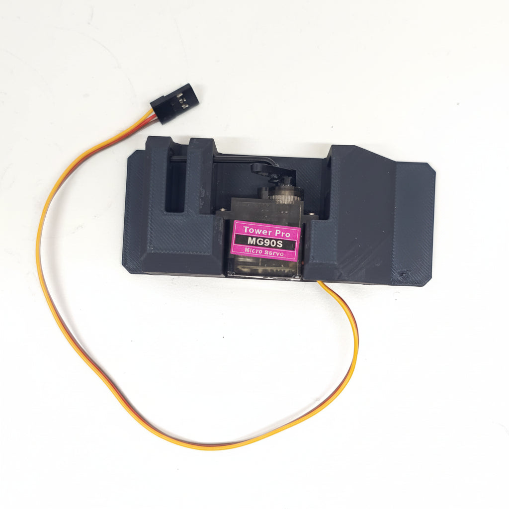 A black servo dispenser air drop rack kit with an attached orange wire and a MG90 servo motor.