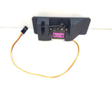 A black servo dispenser air drop rack kit with an attached orange wire and a MG90 servo motor.