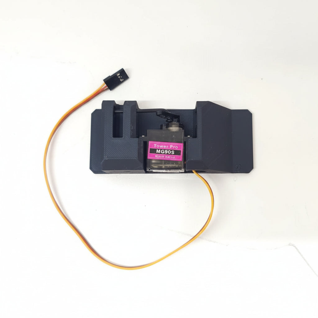 A black servo dispenser air drop rack kit with an attached orange wire and a MG90 servo motor.
