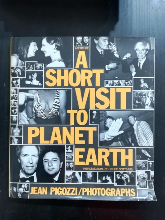A SHORT VISIT TO PLANET EARTH BY JEAN PIGOZZI (HARDCOVER) OLD BOOK