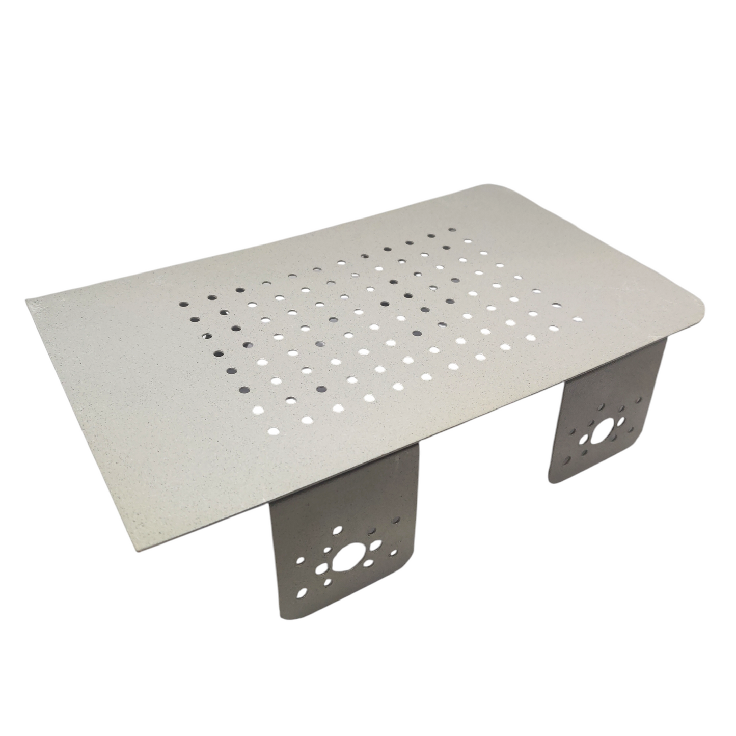 Metal table with perforated top and four legs on a white background