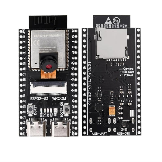 Two ESP32-S3 microcontroller boards shown side by side on a white background, with a blue banner at the top reading 'Not just a Camera – It's a Complete ESP32-S3 Microcontroller Board!'.