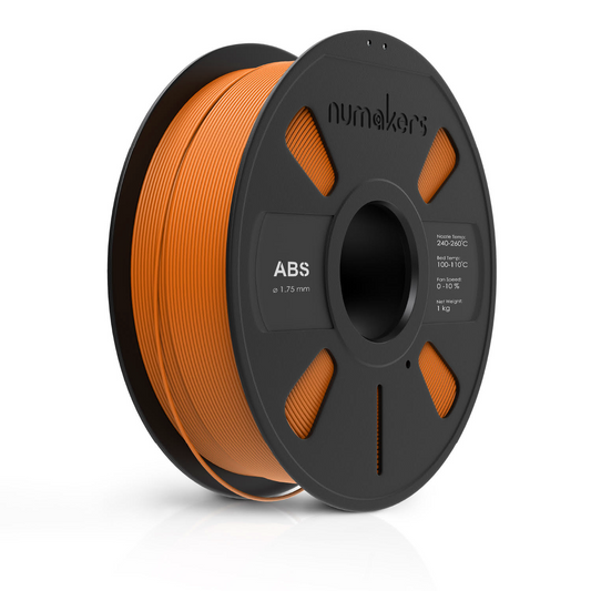 Spool of orange 3D printing filament on a black spool with 'numakers' branding.