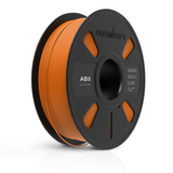 Spool of orange 3D printing filament on a black spool with 'numakers' branding.