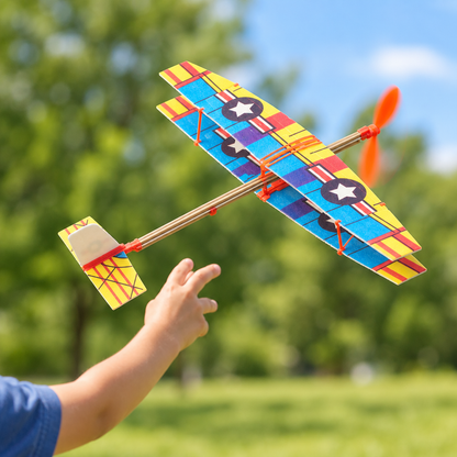 Rubber band powered biplane, Model 818, flying in a park after launch