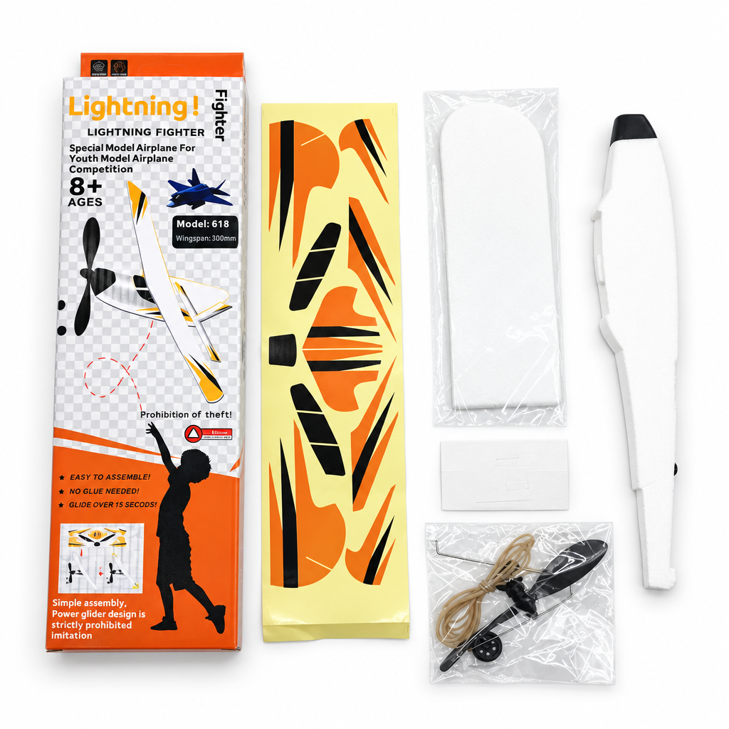 Lightning Fighter model airplane kit flat-lay with box, decal sheet, foam parts, propeller and hardware on a white background