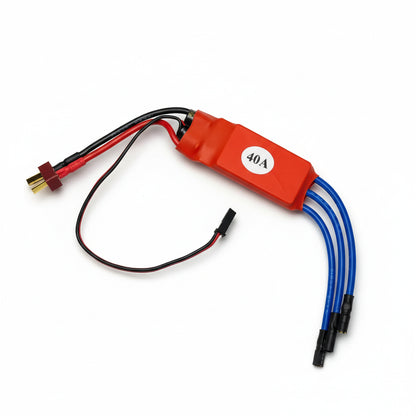 Red electronic component with blue and black wires on a white background