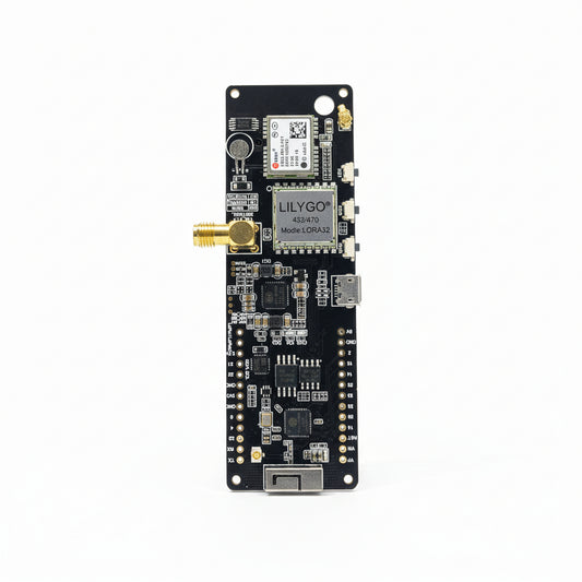 An electronic module with various connectors and antennas, labeled with 'LILYGO' and 'TTGO' branding, intended for IoT and wireless applications.