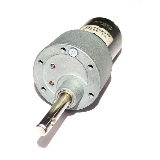 A Johnson DC gear motor with a side long shaft, showing metal construction and a rotating power shaft.